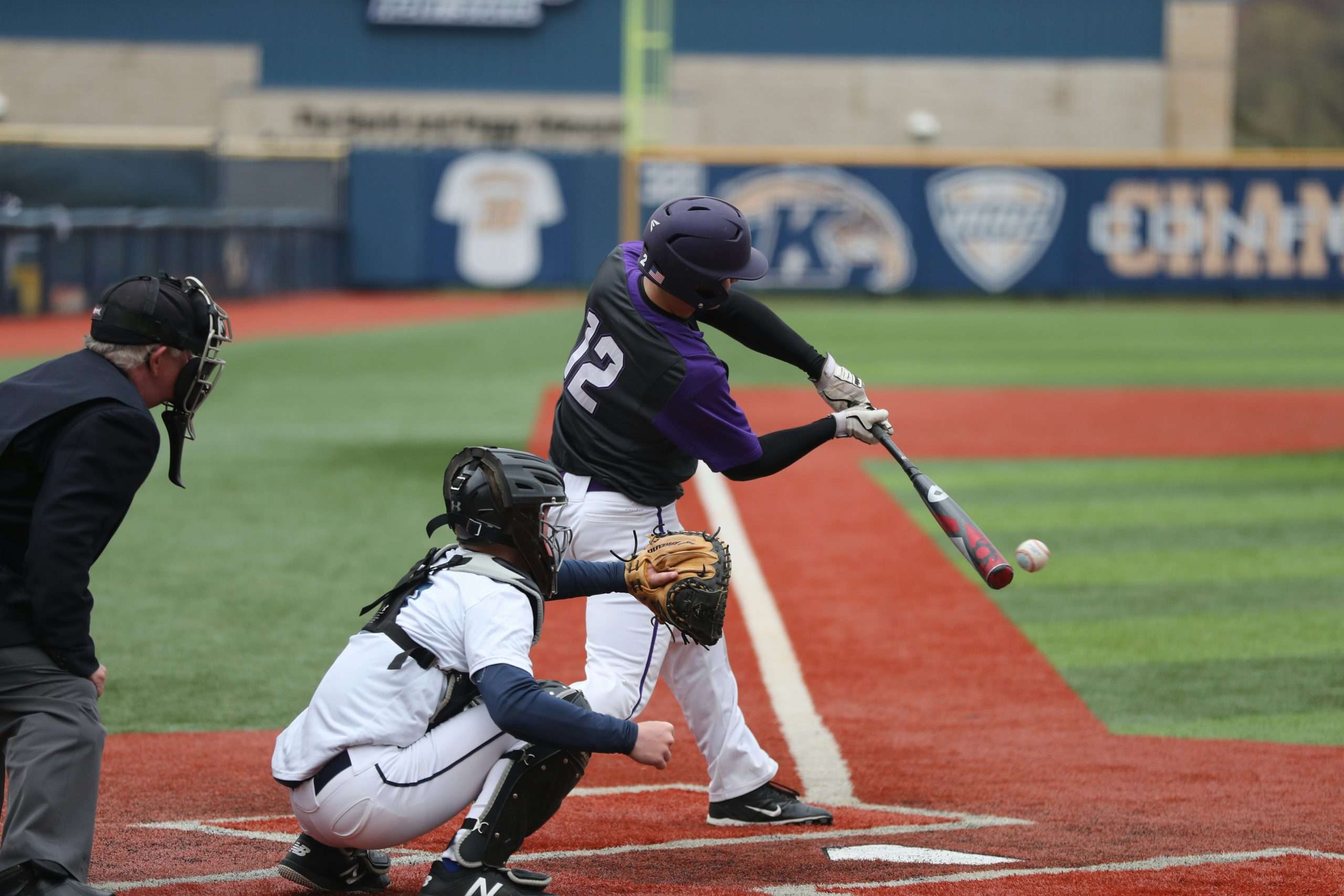 Base hit with baseball uniform