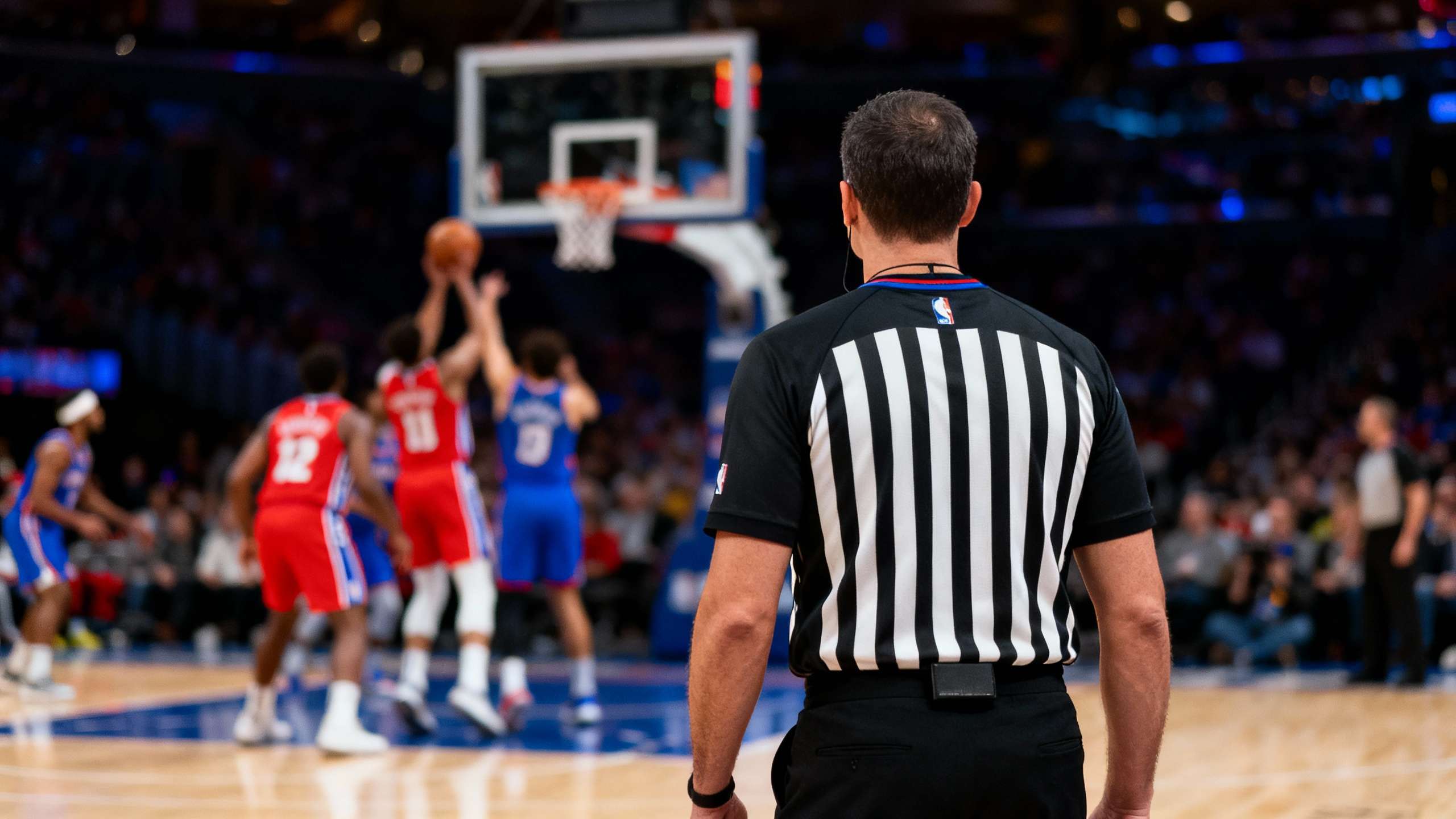 Impact of jersey color on basketball officiating